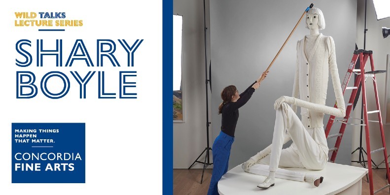 A woman works on a large sculpture using a long wooden stick