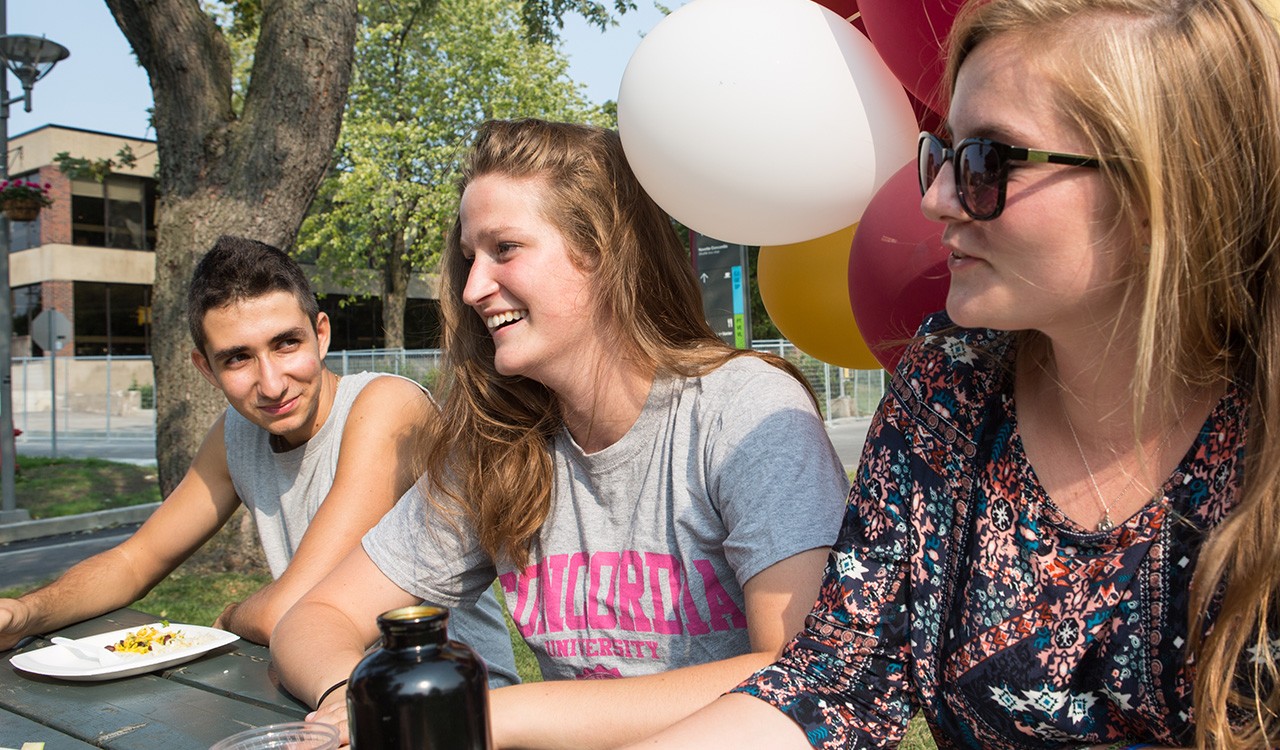 Students sitting on the quad