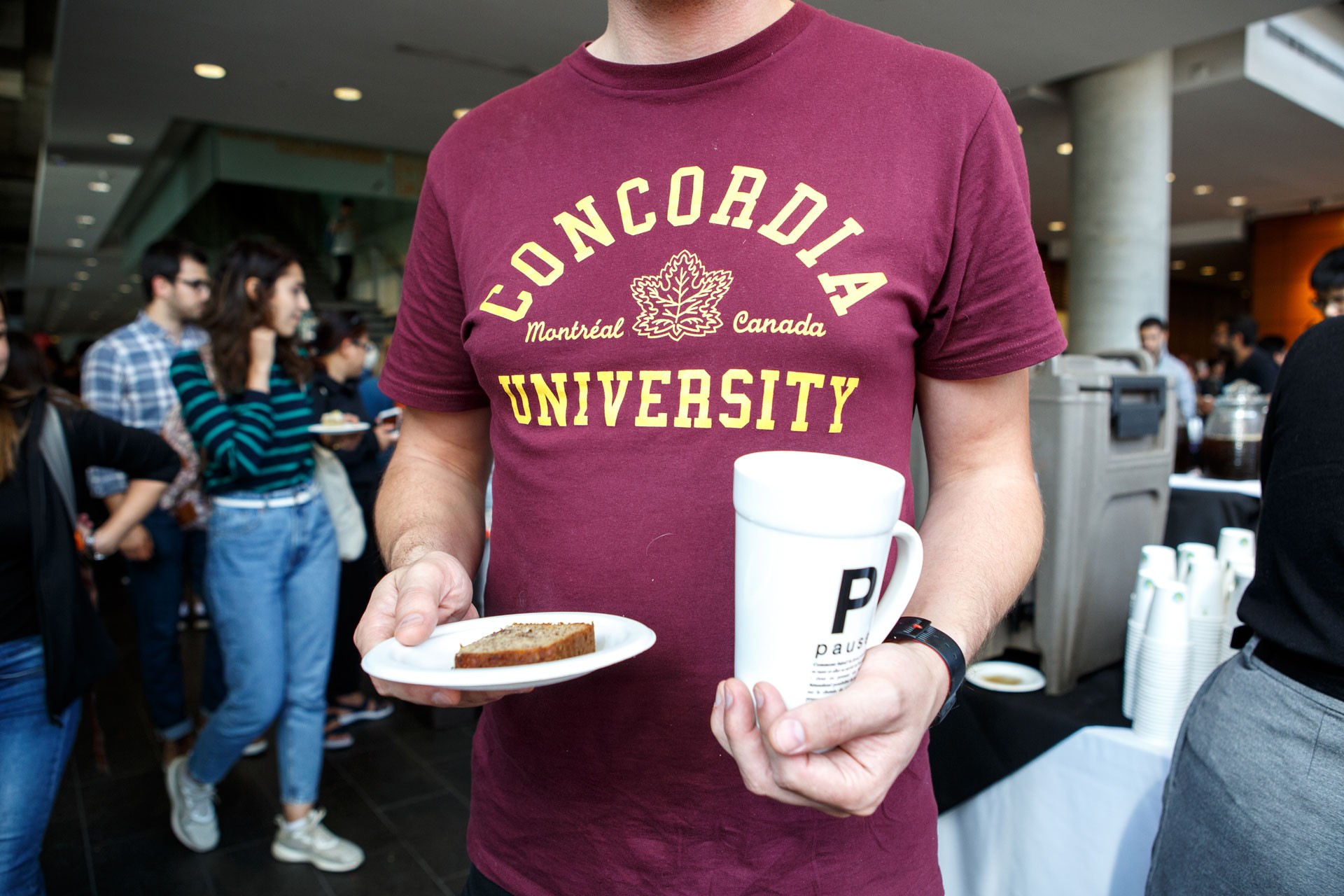 Student holding coffee