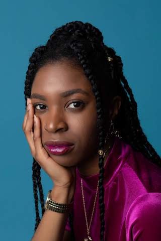 Image depicts artist Esther Calixte-Bea in a magenta top against a turquoise background