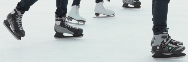 Skaters on an outdoor skating rink