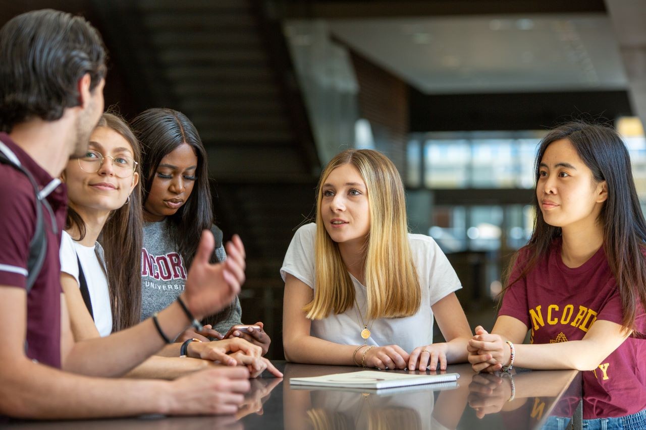 Concordia students chatting on campus