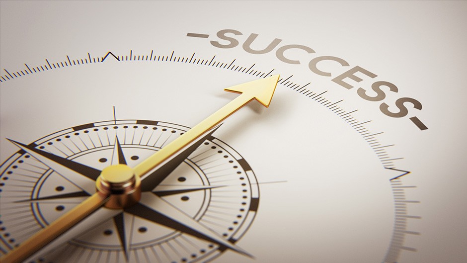 Compass points to "Success"