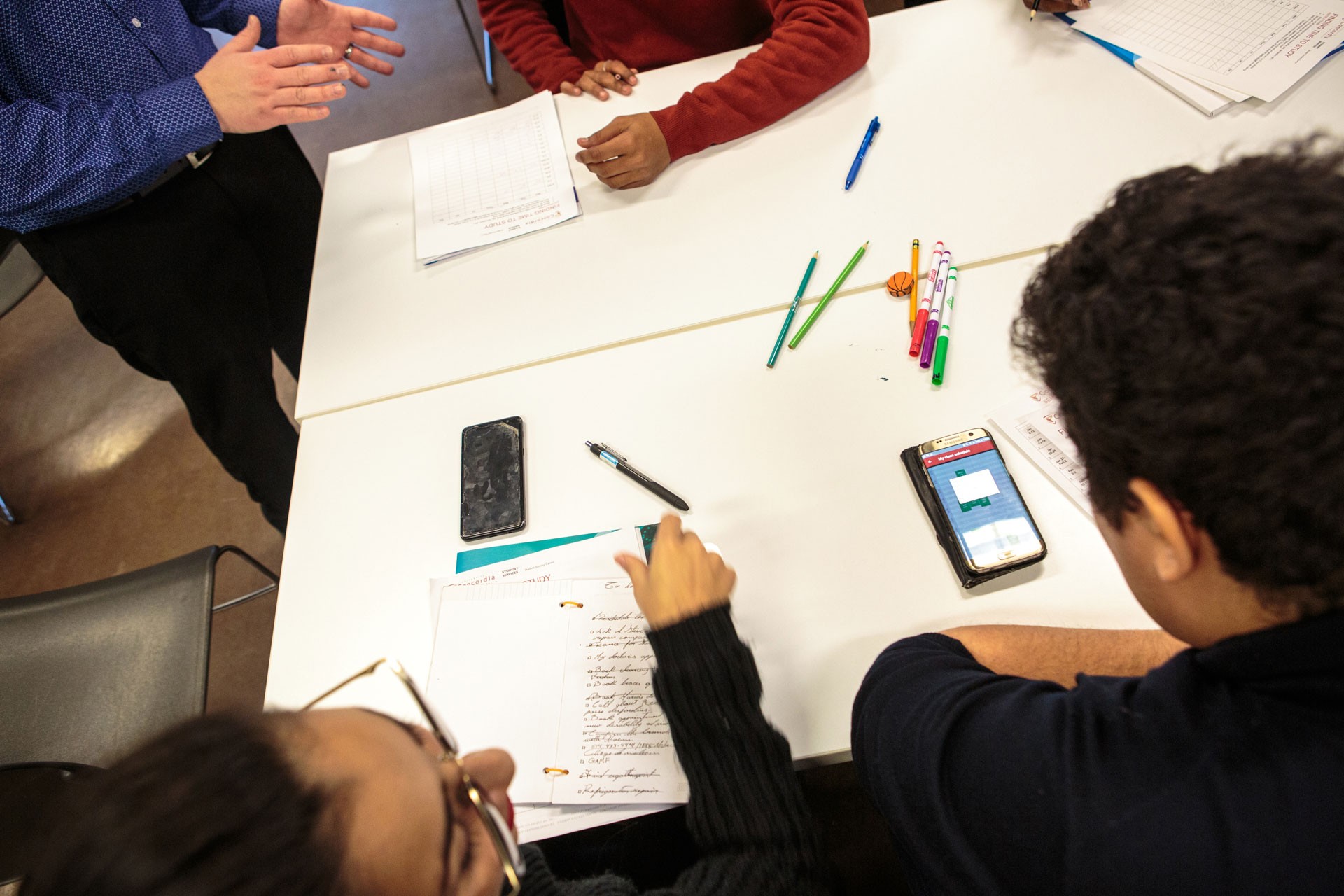 People working together at a big table