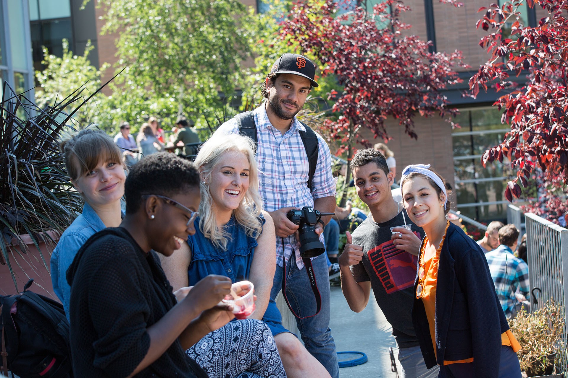 students sitting next to each other at Loyola campus 