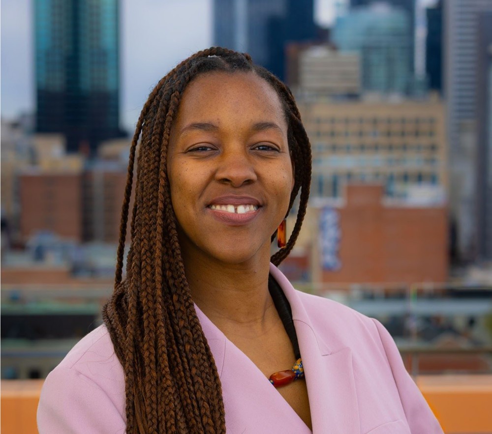 Image of a researcher smiling