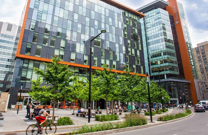 The Guy-De Maisonneuve (GM) Building with a dedicated bike path in front.