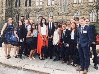 Student participants gather on Parliament Hill, in the presence of federal Ministers and MPs