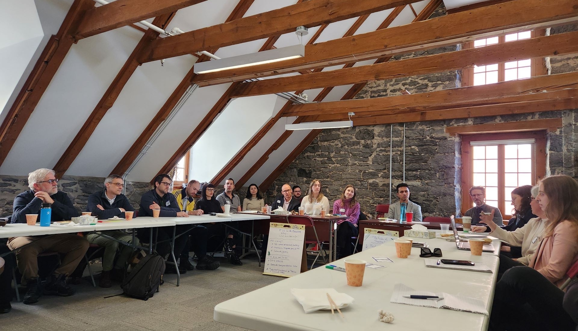 Photo of a large roundtable discussion at TransNex