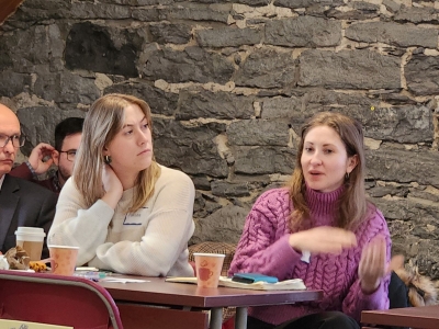 CSLP member Diana Miconi (right) shared her recent research with the TransNex conference