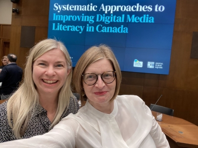 Photo of Julie Corrigan with Michelle Schira Hagerman