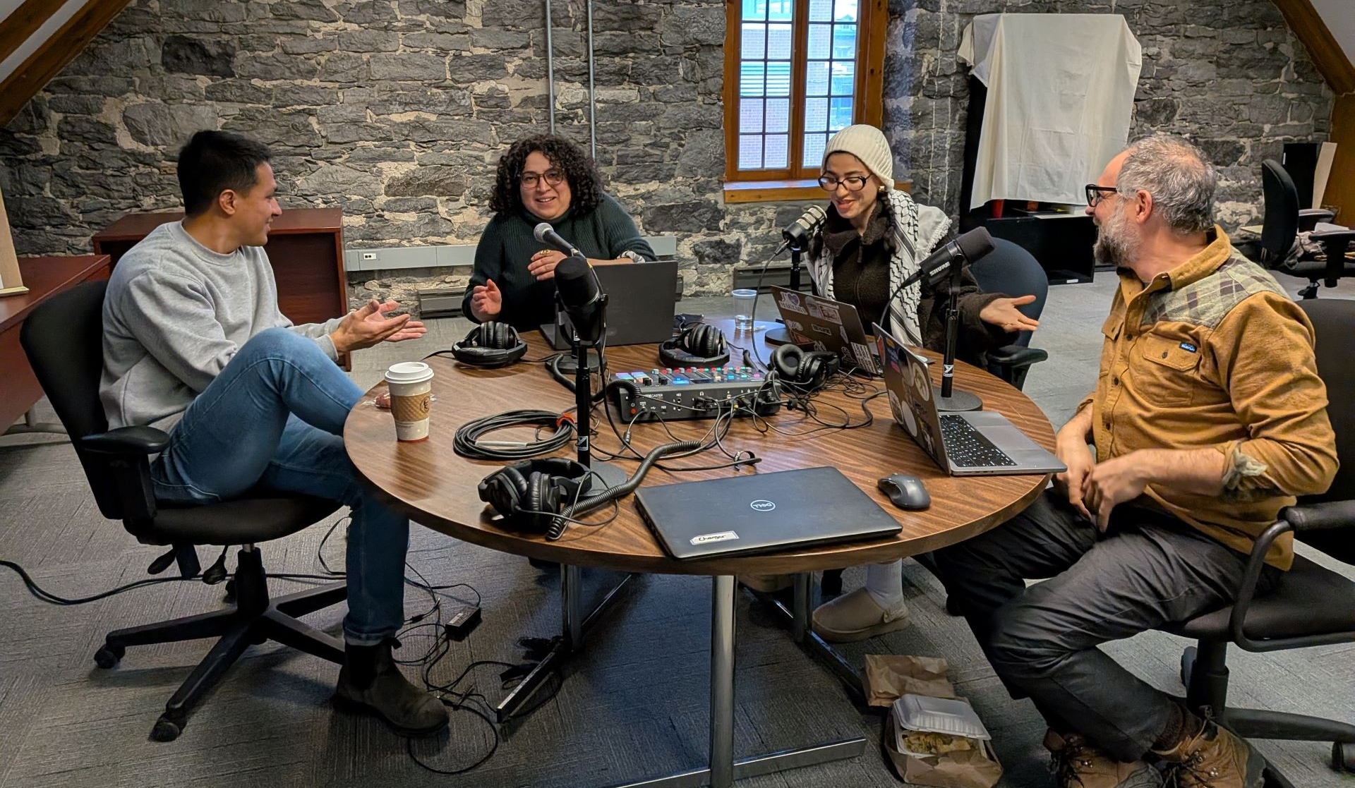 Photo of several participants around a table