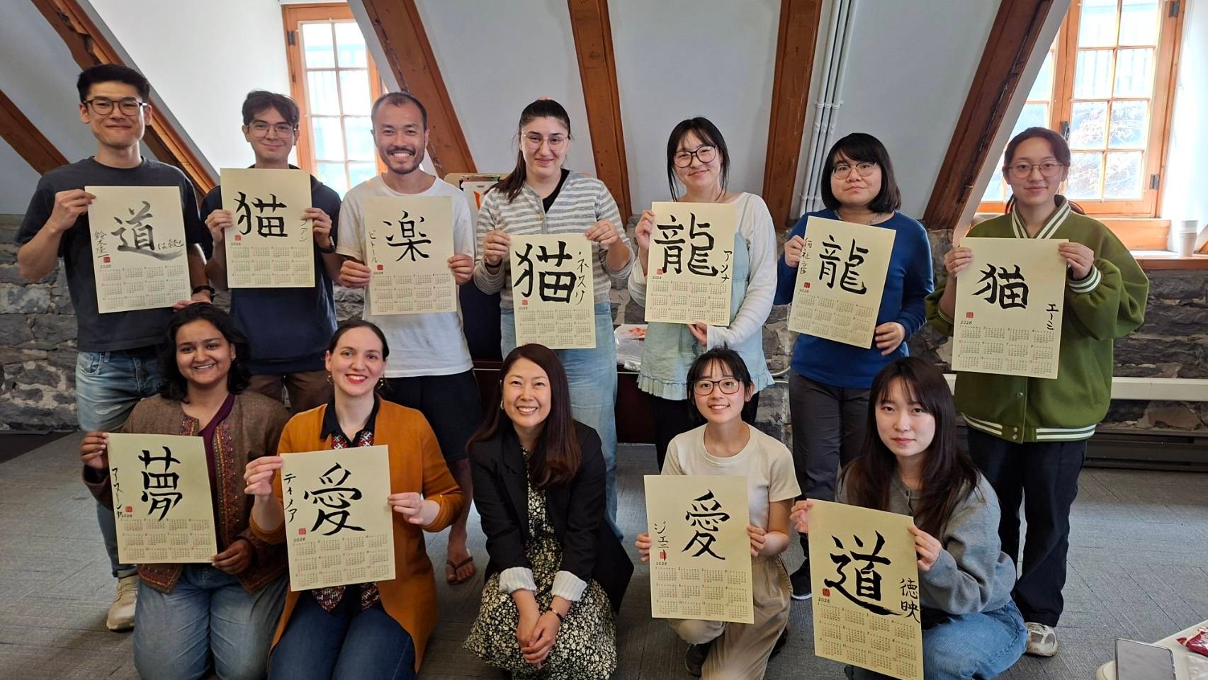 Photo of participants showing off their work