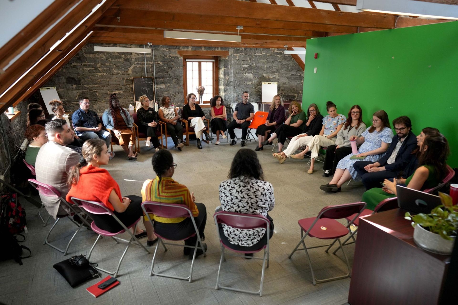 Photo of workshop participants in a large circle