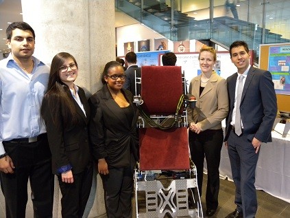 Students display their Easy Stand Transport Wheelchair: [left to right] Babar Chaudry, Erica Too, Tamara Gordon, Amy-Lee Gunter, and Juan Carlos Ramos Perfecto. Supervisor: Hoi Dick Ng, Mechanical and Industrial Engineering