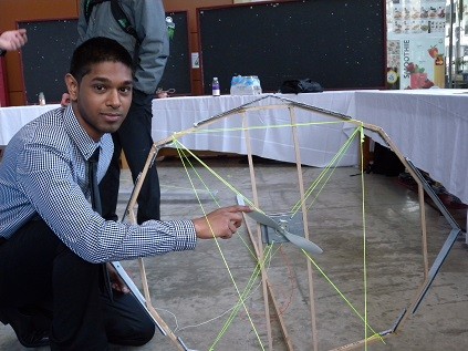 Vishal Patel with the turbine component of the project, Design of an Aerostat High-Altitude Wind Power System (A-HAWP). Supervisor: Wahid Ghaly from Mechanical and Industrial Engineering