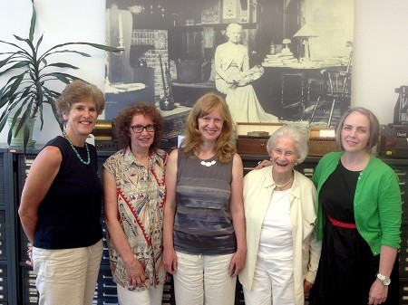 From left to right, Wanda Bubriski, Janice Anderson, Kristina Huneault, Beverly Willis, Cynthia Hammond, shown with a photograph of artist Mary Hiester Reid (1854-1921). Photo credit: Braden Scott, 2013.