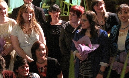 Dr Catherine MacKenzie, in the centre of the image (red hair) stands with a group of Outstanding Contribution Award recipients in the Loyola Chapel, Thursday, April 3, 214. Photo: C. Hammond. Dr Catherine MacKenzie, in the centre of the image (red hair) stands with a group of Outstanding Contribution Award recipients in the Loyola Chapel, Thursday, April 3, 214. Photo: C. Hammond.