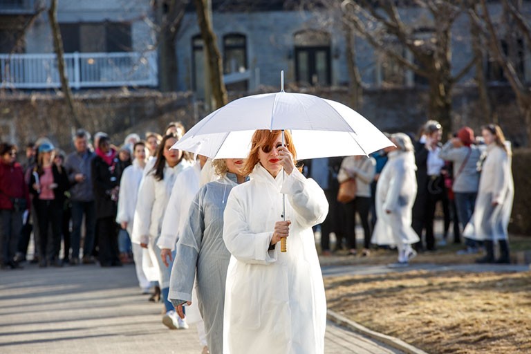Co-organizer Cynthia Hammond organized a performance of fifteen women dressed in white at the Canadian Centre for Architecture. 