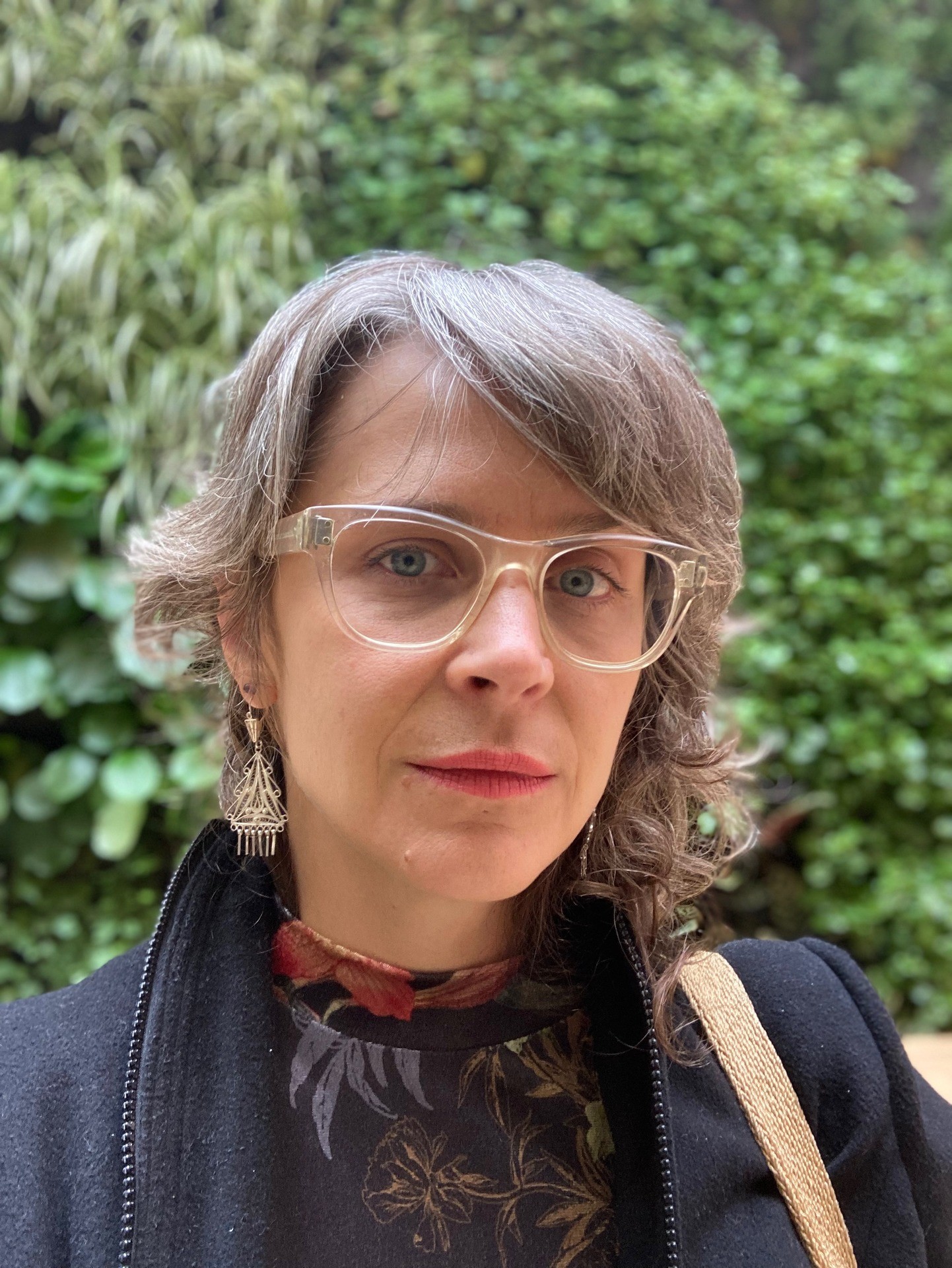 Gwynne Fulton portrait of woman grey hair and glasses in nature