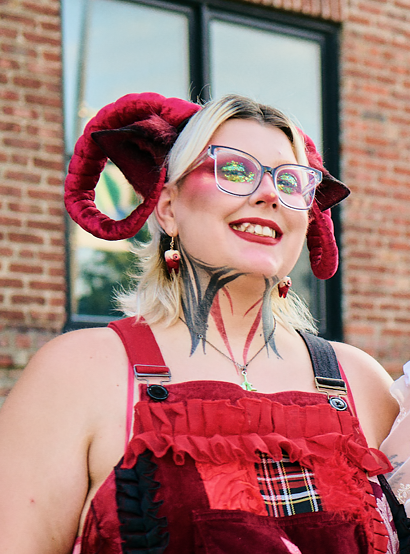 Young woman wearing red joker outfit