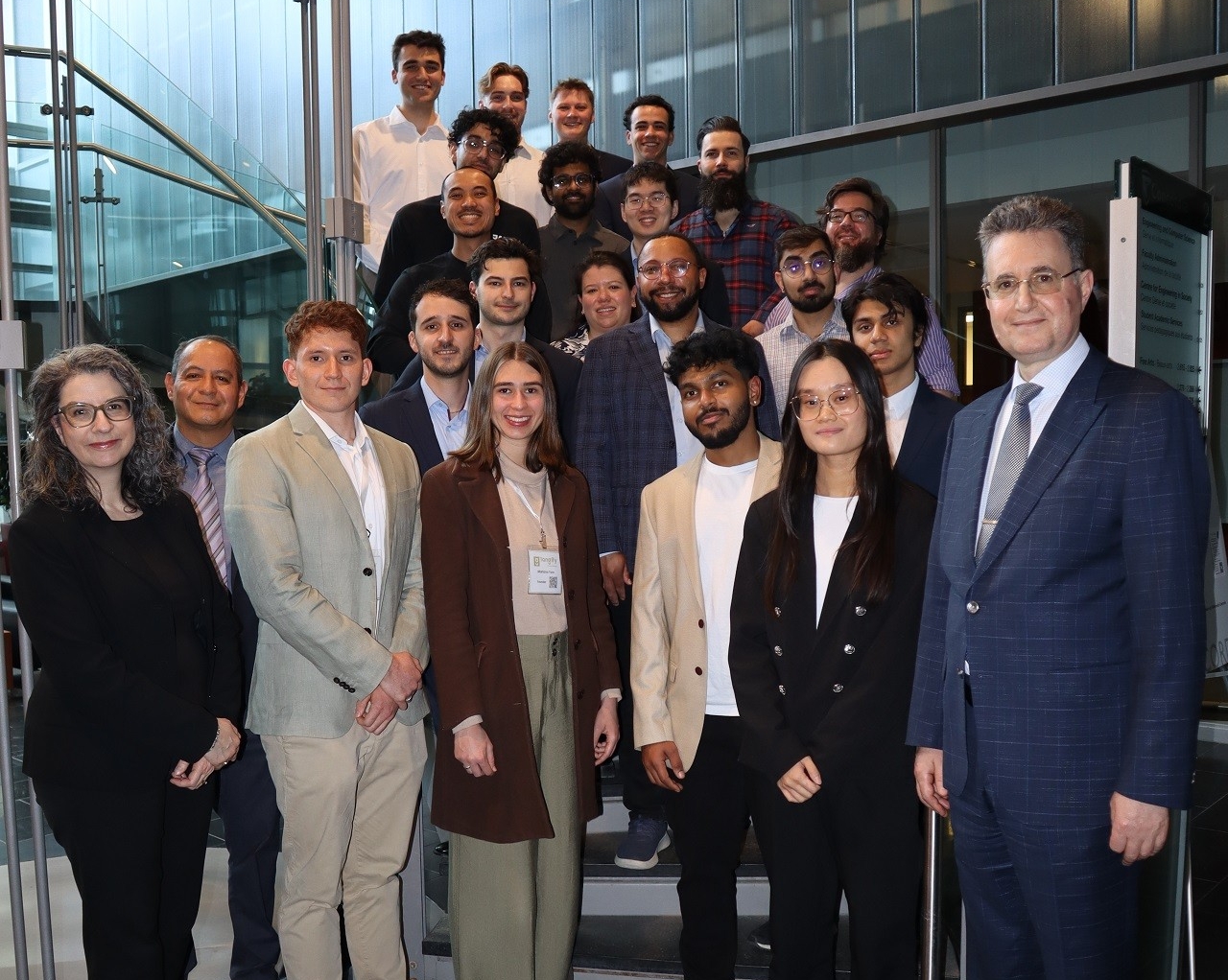 Group photo with Dean Mourad Debbabi, student entrepreneurs and staff at the Innovation Fund Demo Day.