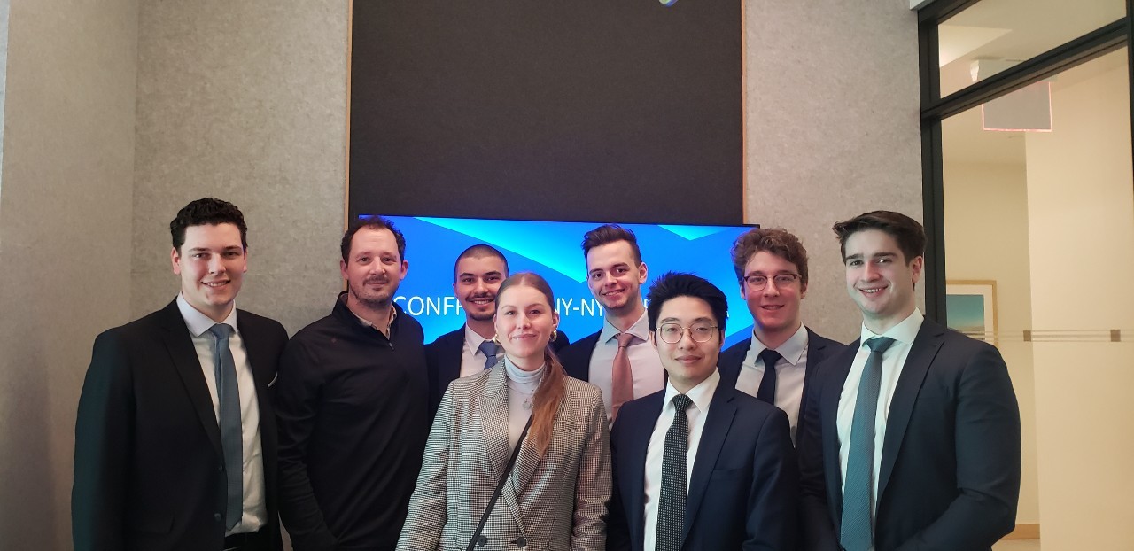 Michael Knight, BComm 12, second from left, hosting KWPMP students at Merrill Lynch’s office in New York City