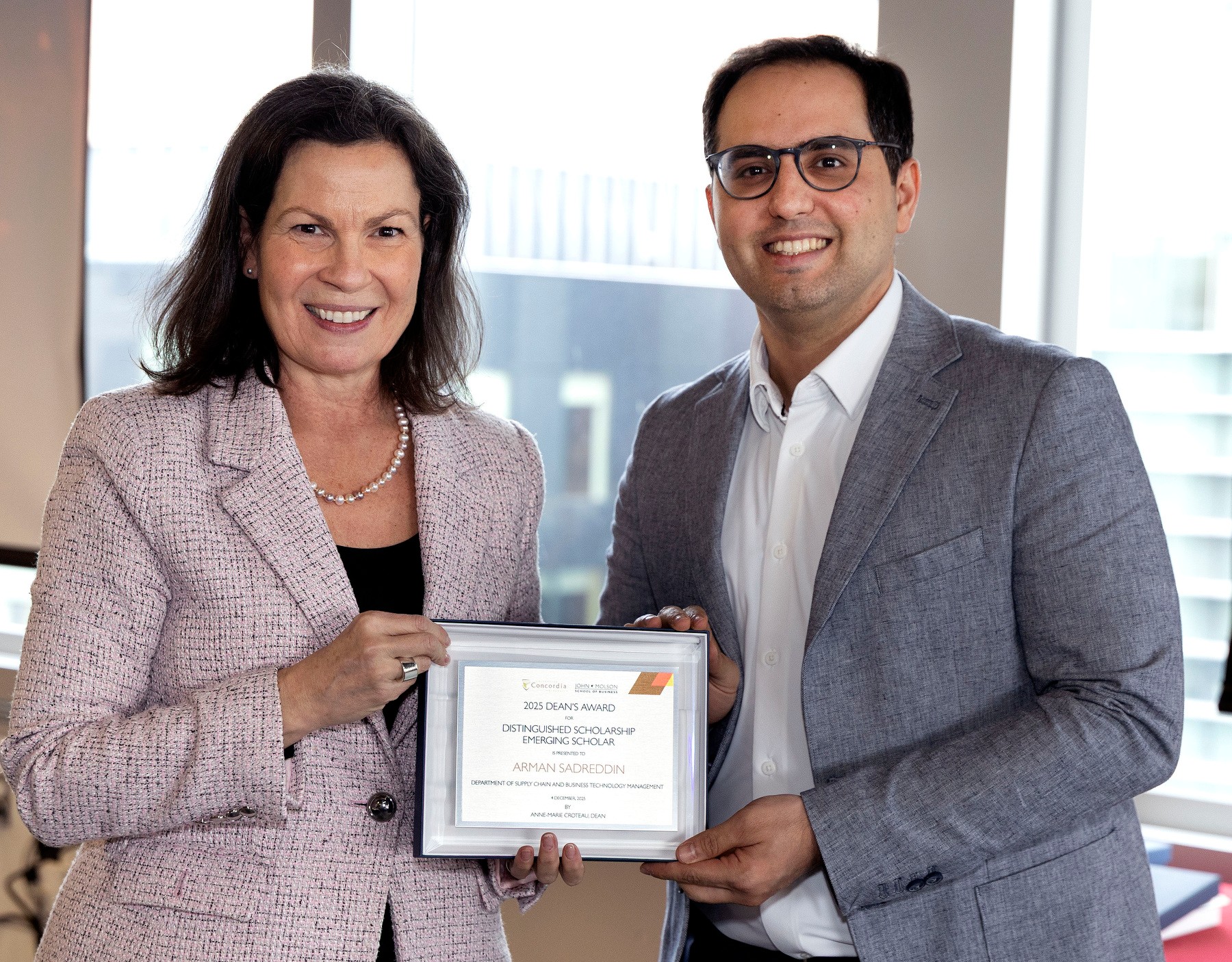 Anne-Marie Croteau, dean, with Arman Sadreddin, winner, emerging scholar award 2025