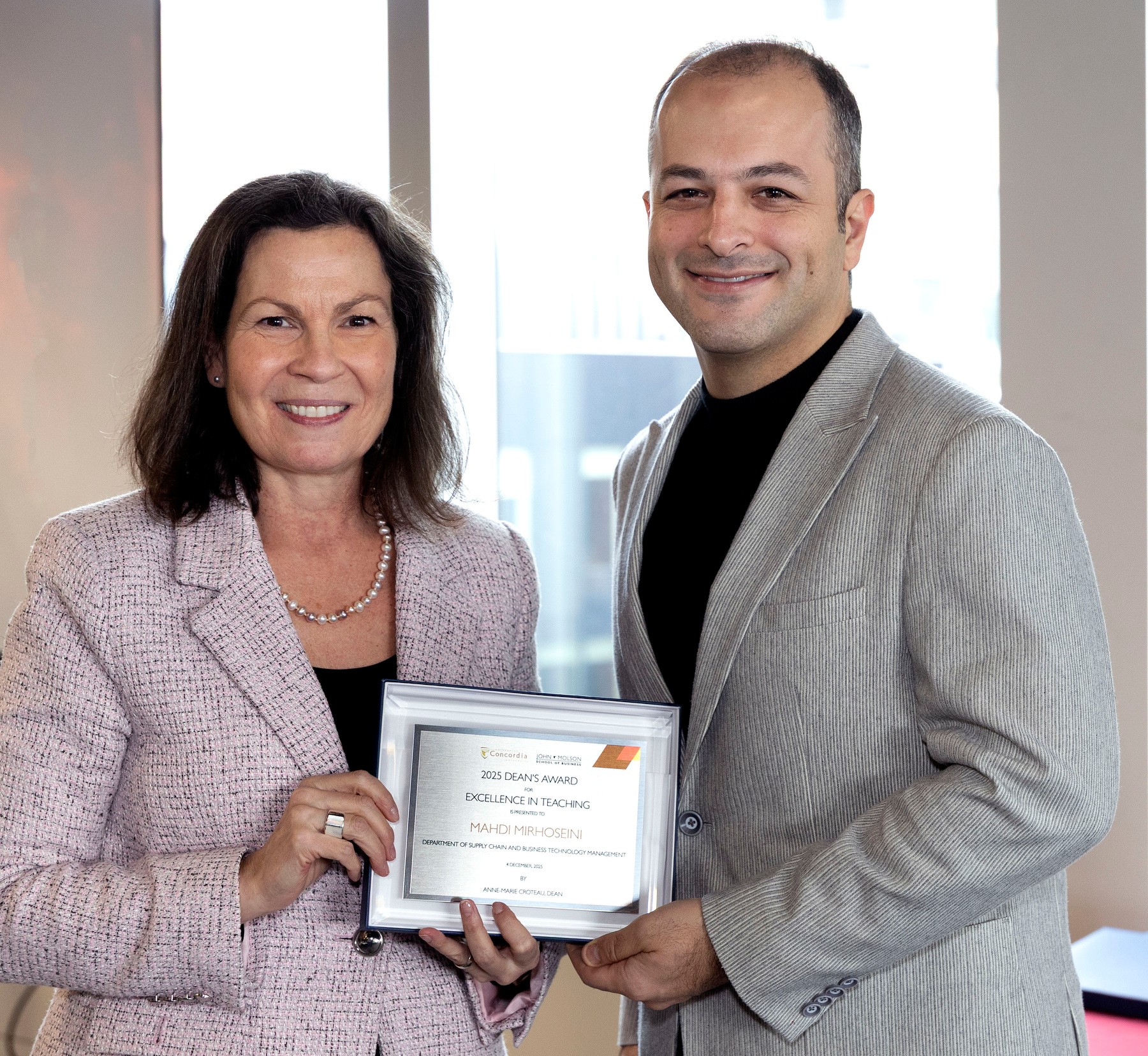 Anne-Marie Croteau, dean, with Mahdi Mirhoseini, winner of the Dean's Award for Excellence in Teaching 2025