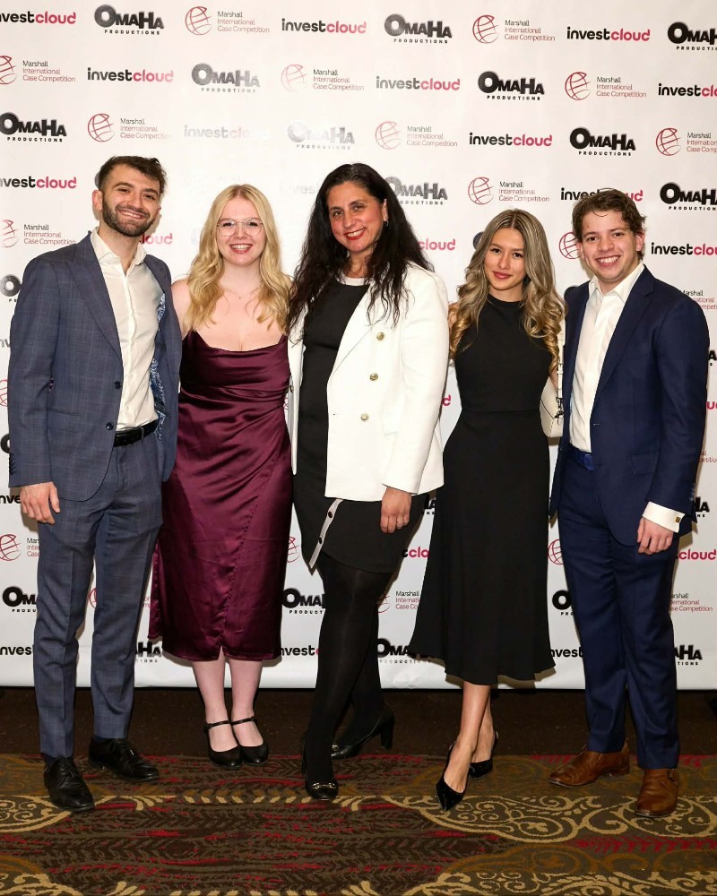 Nora Baronian with students in the case competition committee