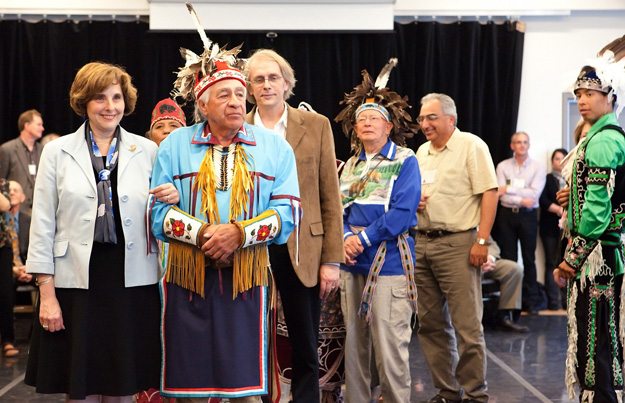 President Judith Woodsworth, at left, takes part in a dance of indigenous peoples at the signing of the Accord on Indigenous Education duringCongress 2010. The agreement provides for a new framework under which university programs will work to better reflect the educational purposes and values of Indigenous people. Photo by Concordia University.