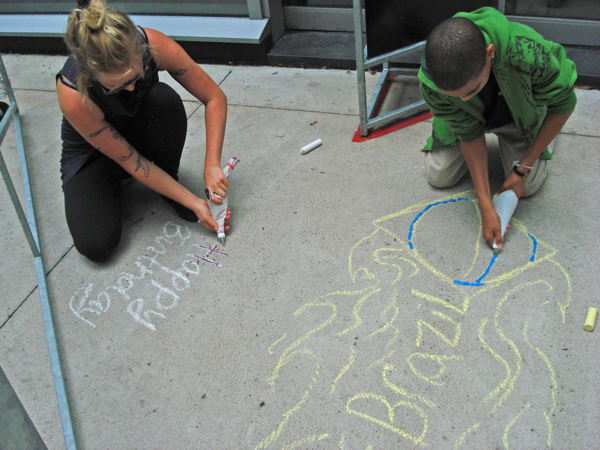 Members from the Tyndale St. George’s Community Centre try sugar graffiti.