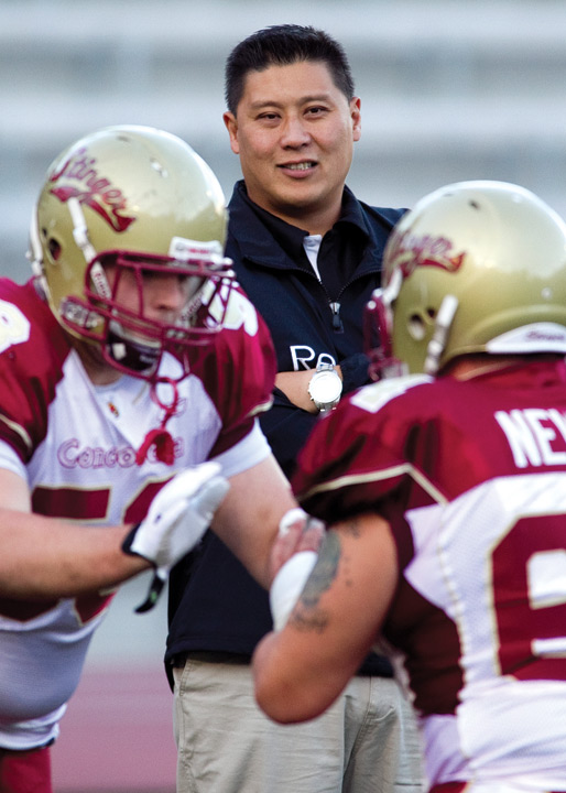 (Above and below) Offensive line coach and coordinator Bryan Chiu and his team before theStingers’ 34-29 Shaughnessy Cup win over McGill, Sept. 17. | Photo by Andrew Dobrowolskyj