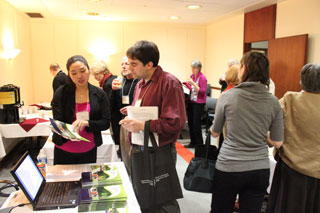 Nina Kim (Montreal Community Economic Development and Employability Corporation) shares information with conference guests. Courtesy of Lorraine O’Donnell