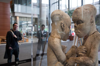 Concordians inspect The Starving of Saqqara displayed in Atrium of Engineering, Computer Science and Visual Arts Integrated Complex.