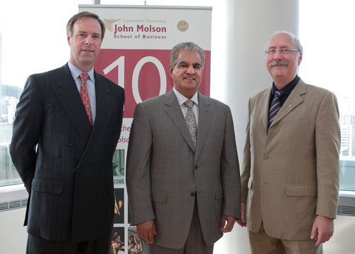 Sanjay Sharma (centre) with Peter Kruyt, Chair of the Board of Governors and Provost David Graham.