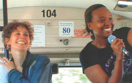 Liz Miller (left) and Leontine Uwababyeyi during a bus tour organized in 2010 as part of the Mapping Memories project. | Photo courtesy of Liz Miller
