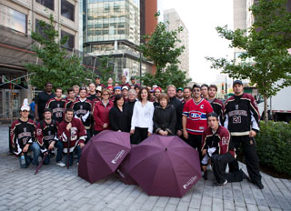 Members of the Concordia Centraide Committee are joined by the men’s hockey team on September 23 for the March of the Umbrellas, which kicks off the campaign each year. | Photos by Concordia University