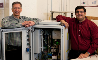 Luiz Lopes (left) and Sheldon Williamson in the Power Electronics Energy Research lab. | Photo courtesy of Luiz Lopes