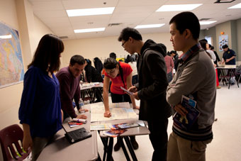 Students from the Language Institute at Concordia’s School of Extended Learning present to their teachers and peers their posters that feature Canadian customs and attractions. | Photos by Concordia University