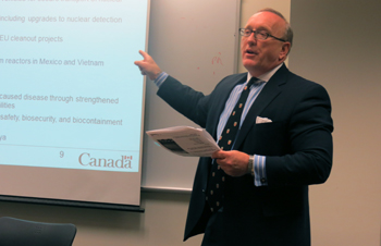 Gregory Newman, senior counsel with the Department of Justice of Canada and Concordia graduate, speaks to political science students about life and career following university. | Photo by Julia Asselstine.
