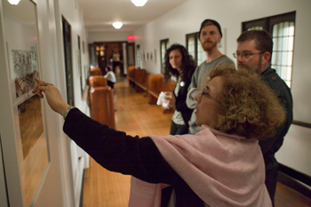 Archivist Emerita Nancy Marrelli leads a tour of the Loyola Chapel exhibition.