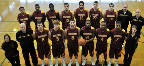 Lusthaus proudly stands (at far left) with with the Concordia Stingers men's basketball team for their team photo. Photo courtesy of Recreation and Athletics.