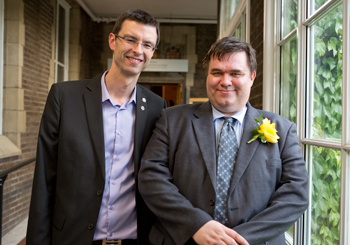 William E. Lynch (on right) after receiving his Academic Leadership award, with Peltier-Rivest.