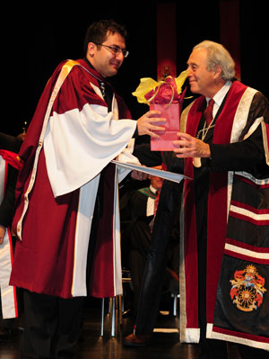Aidin Mehdipour with Concordia's President and Vice-Chancellor Frederick Lowy at the Faculty of Engineering and Computer Science ceremony. Mehdipour was recognized for his doctoral thesis and commended on his foray into new areas of research for the aerospace and avionic industries.