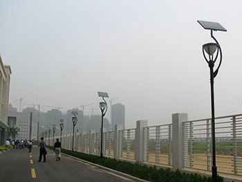 In Shanghai, visitors quickly notice pollution, as well as one of the green measures taken to reduce fossil fuel dependency, solar powered lamps.