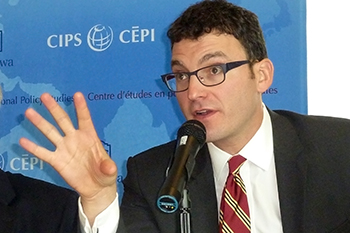 Panel discussion host and CBC television journalist Evan Solomon fields questions from the crowd during the event marking Ottawa's designation of Will to Intervene Day.