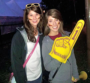 Lesley De Marinis (right) enjoys her first Homecoming football game.