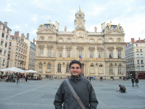 Concordia PhD student in mathematics Oscar Quijano takes a break in front of the city hall in Lyon, France, during the 25th annual Entretiens Jacques Cartier. 