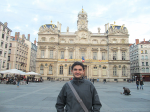 Concordia PhD student in mathematics Oscar Quijano takes a break in front of the city hall in Lyon, France, during the 25th annual Entretiens Jacques Cartier.